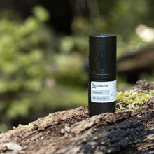 Load image into Gallery viewer, Product shot of ReBoost – Hyaluronic Acid Booster on a log in nature
